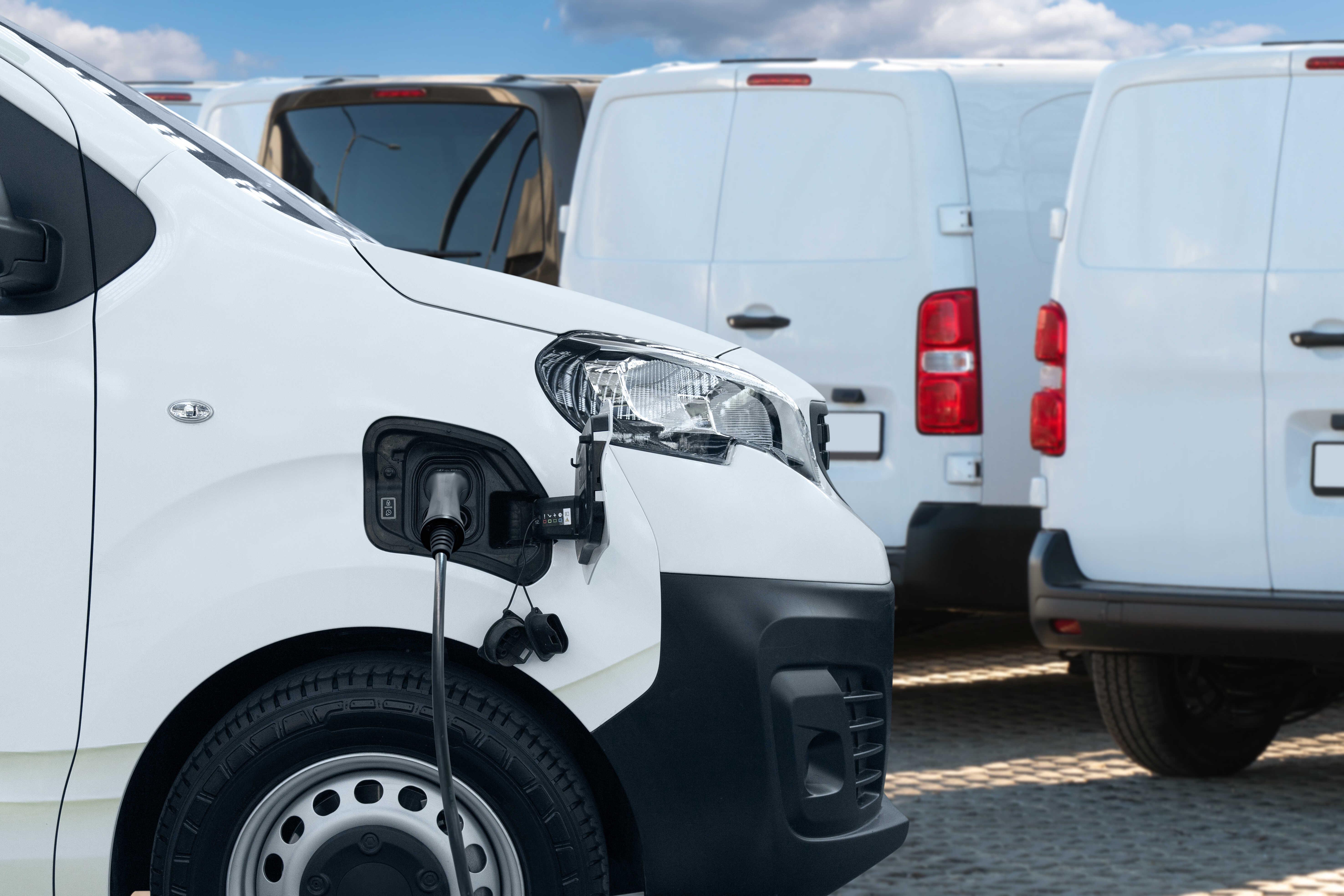 Electric delivery vans with electric vehicles charging station