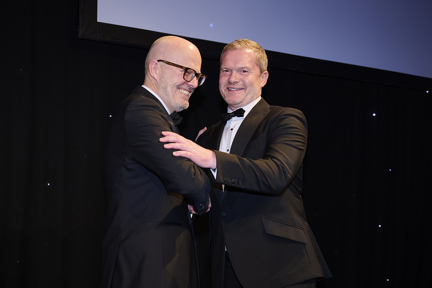 Joint Freddie Aldous award winner Martin Brown receiving award from BVRLA Chief Executive Toby Poston