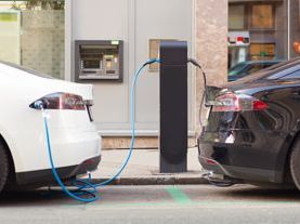 Policy_Decarbonisation_Electric Vehicle EV two cars charging 01.jpg