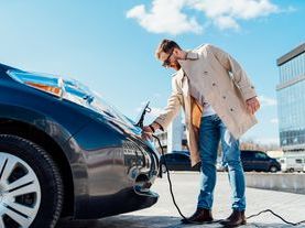 Policy_Decarbonisation_man charging EV.jpeg