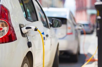 Policy_Decarbonisation_Electric Vehicle EV two cars charging 02.jpg