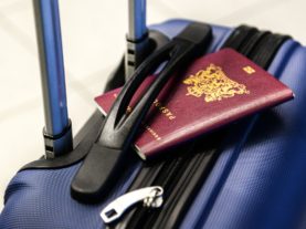 Staitc Images_Passport Suitcase Tourist Travel.jpg